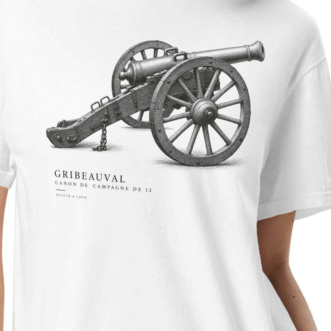 Source-derived digital mockup detail of the White Gribeauval T-shirt showing the complete cannon and original lettering; not a physical sample photograph